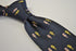 navy tie with seahorse design